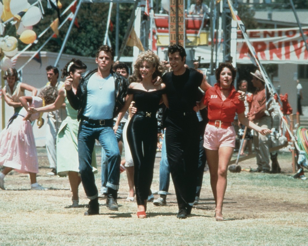 The cast of 'Grease' during the carnival scene, 1978