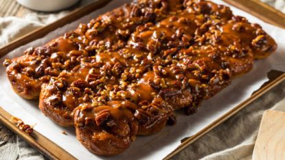 sticky buns with pecan topping in baking dish