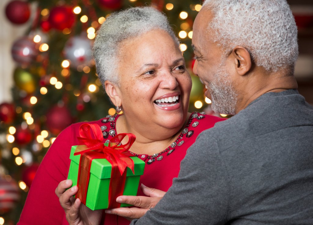 Couple exchanging gifts on Christmas