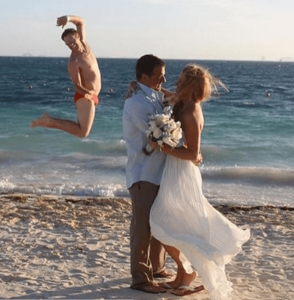 wedding photo fail beach photobomb speedo