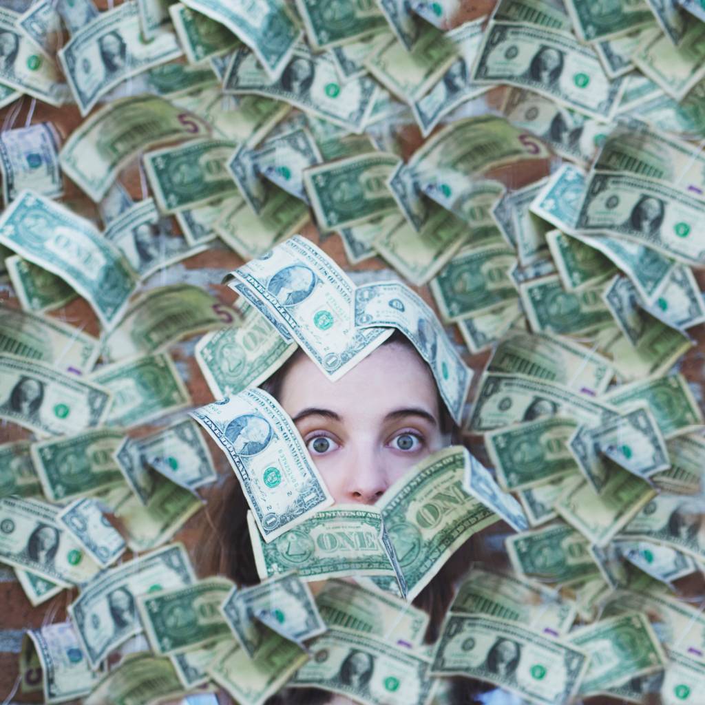 Woman Surrounded By Money