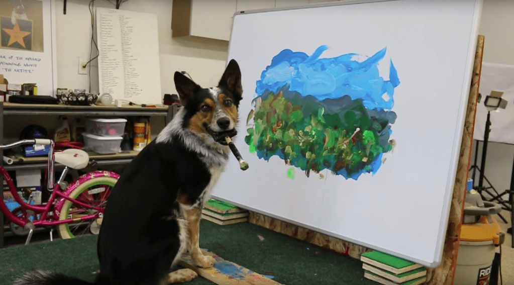 Jumpy dog painter