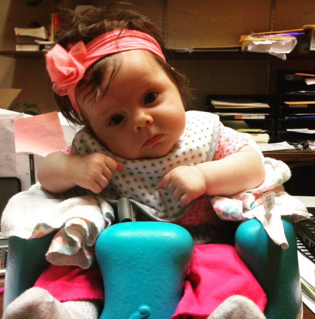 babies born with tons of hair bow