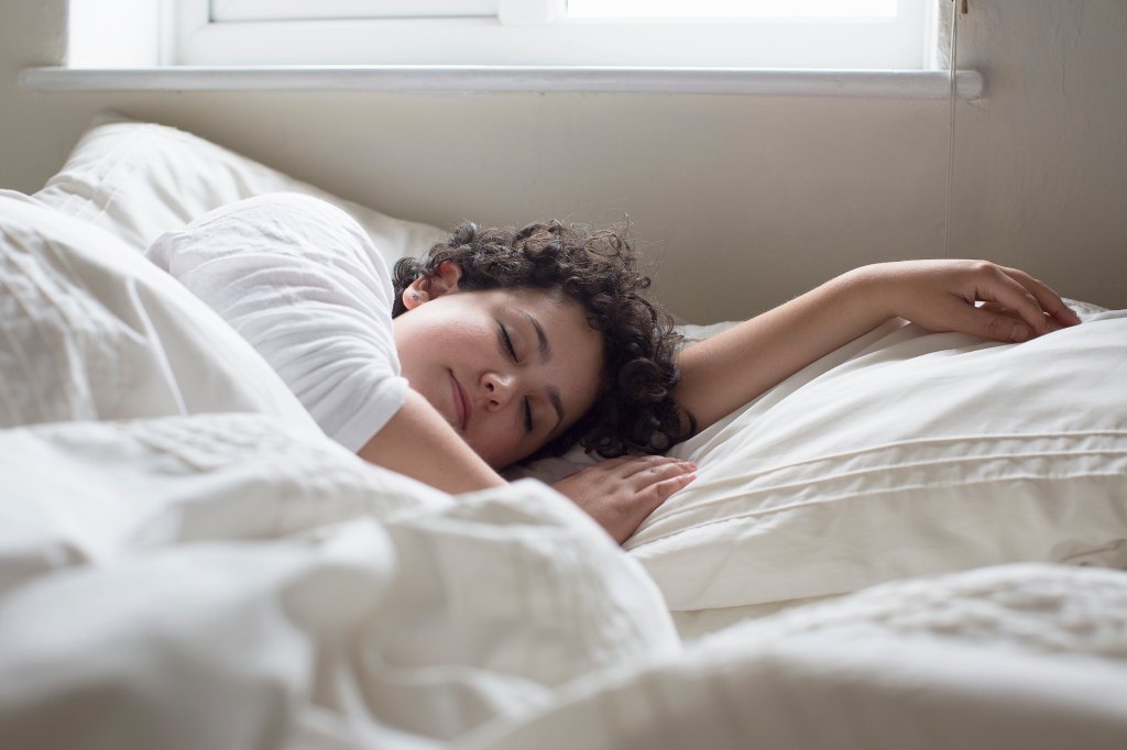 sleeping with arms outstretched