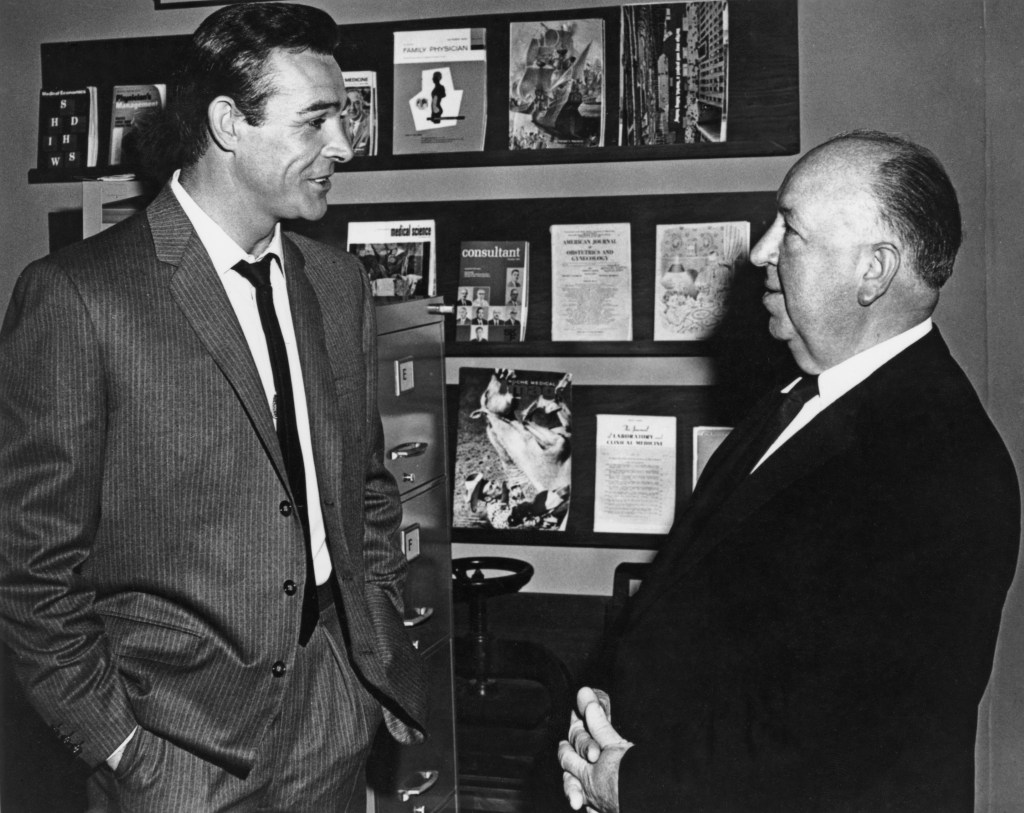 Sean Connery and Alfred Hitchcock on the set of 1964's Marnie