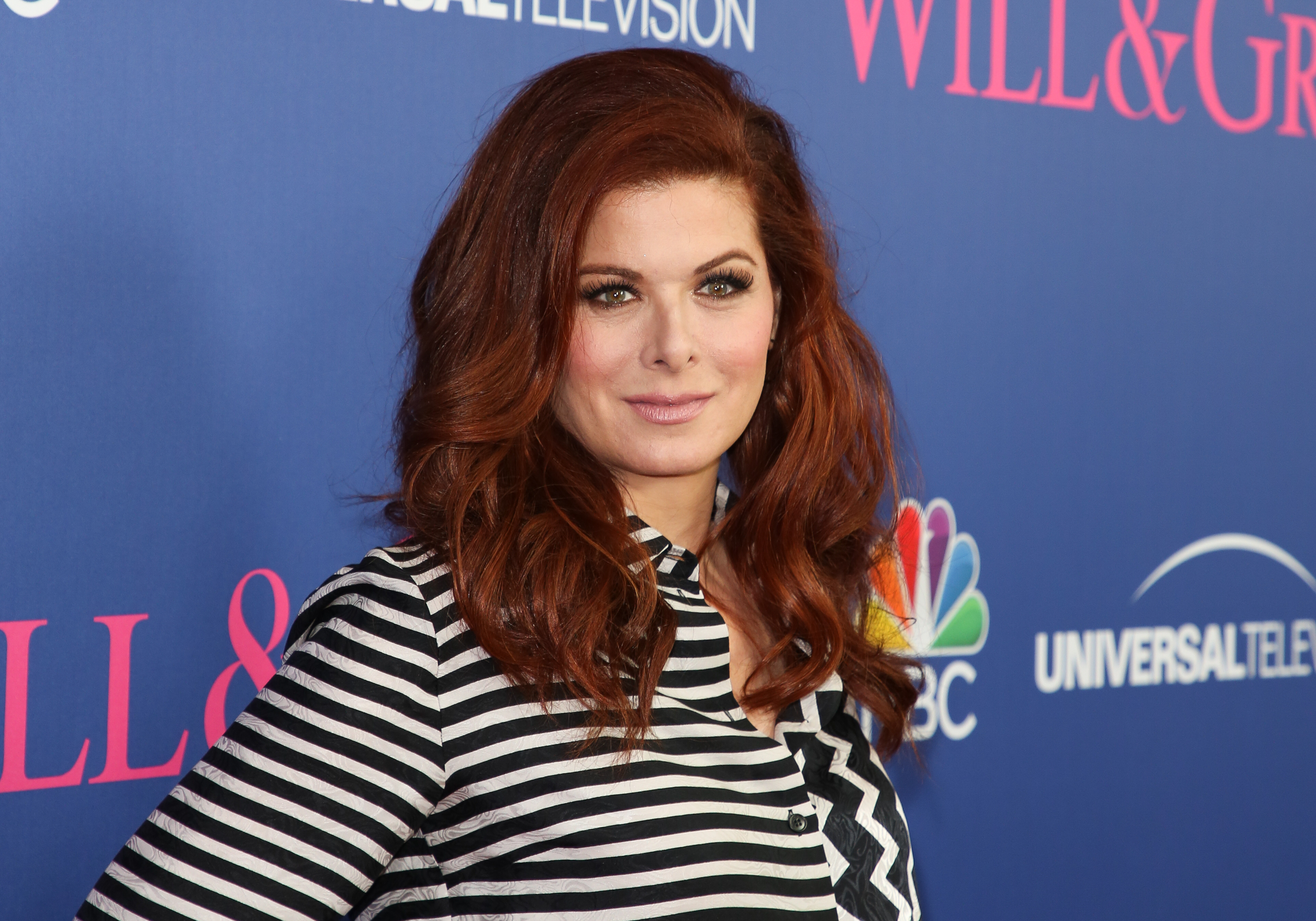 Debra Messing's Hair Looks Flawless Because She Rarely Washes It