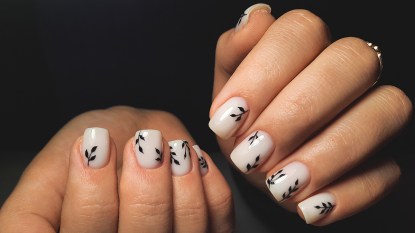 Black and white leaves nail art for natural classy short acrylic nails