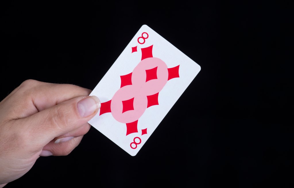 Highlighted figure 8 on 8 of diamonds card