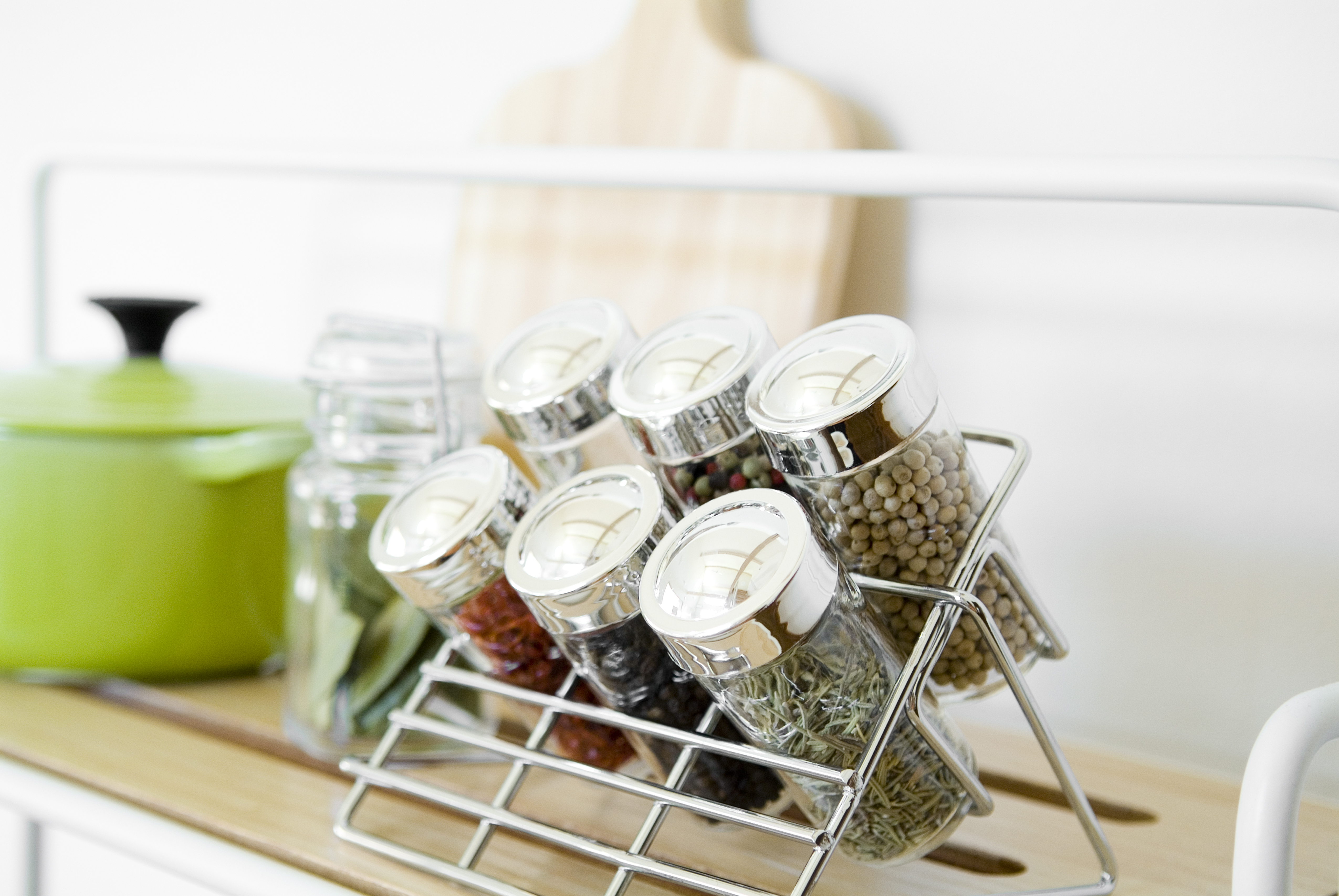 Tiered spice rack for better kitchen pantry storage.