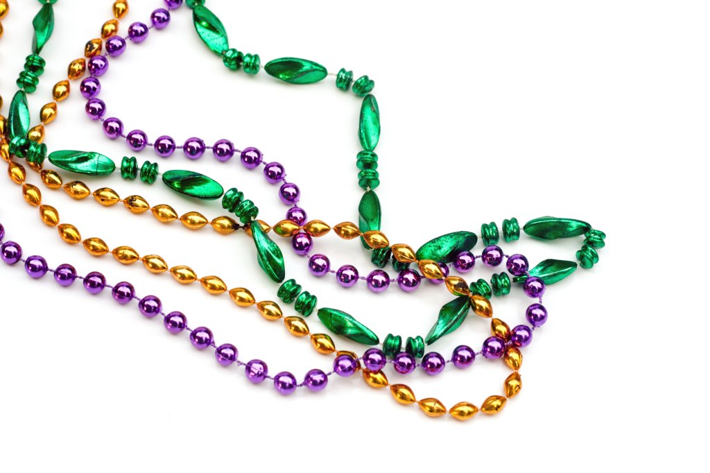 mardi gras beads purple green gold