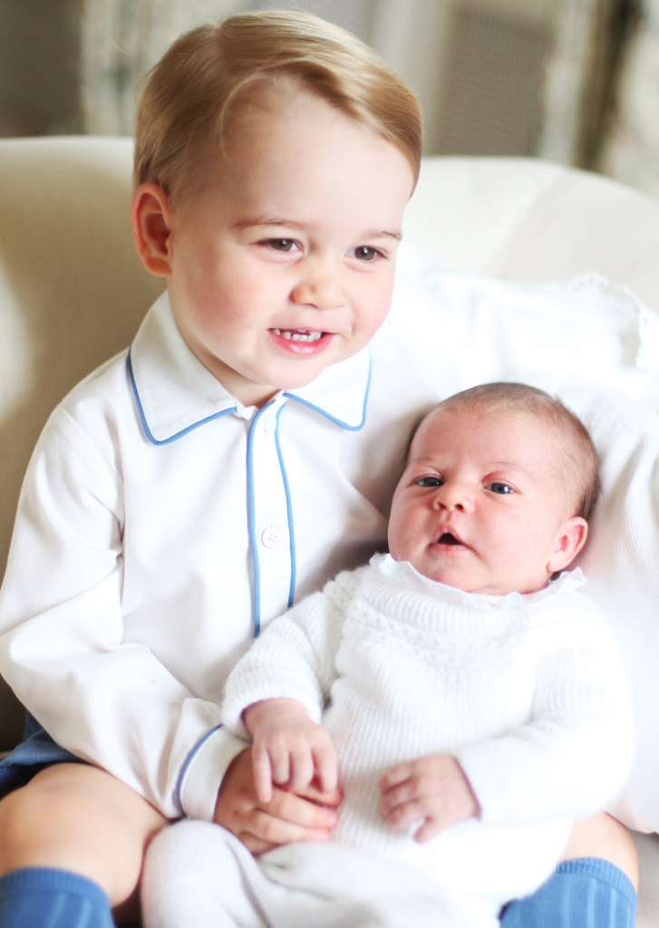 prince george holding princess charlotte