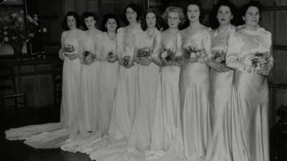 WWII: Britain: WRENS: Nine wedding gowns specially sent to Britain for members of the WRENS (Women's Royal Naval Service) to wear 'when the occasion arises' have now arrived in London. Five of these dresses were collected and sent by Mrs G. Shaw Green, of Dayton, Ohio, and the nine - through the British War relief Society of America and the Dudley House Committee - have now been handed over to the WRENS. Any WREN who is getting married will be able to make application for one of the beautiful gowns. Picture shows: Members of the Women's Royal Naval Service wearing the wedding dresses after their arrival in London Northcliffe Collection : WWII
