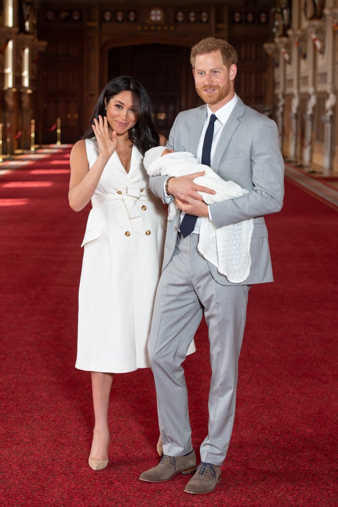 meghan markle, duchess of sussex, holding her son, prince archie, with husband prince harry, duke of sussex