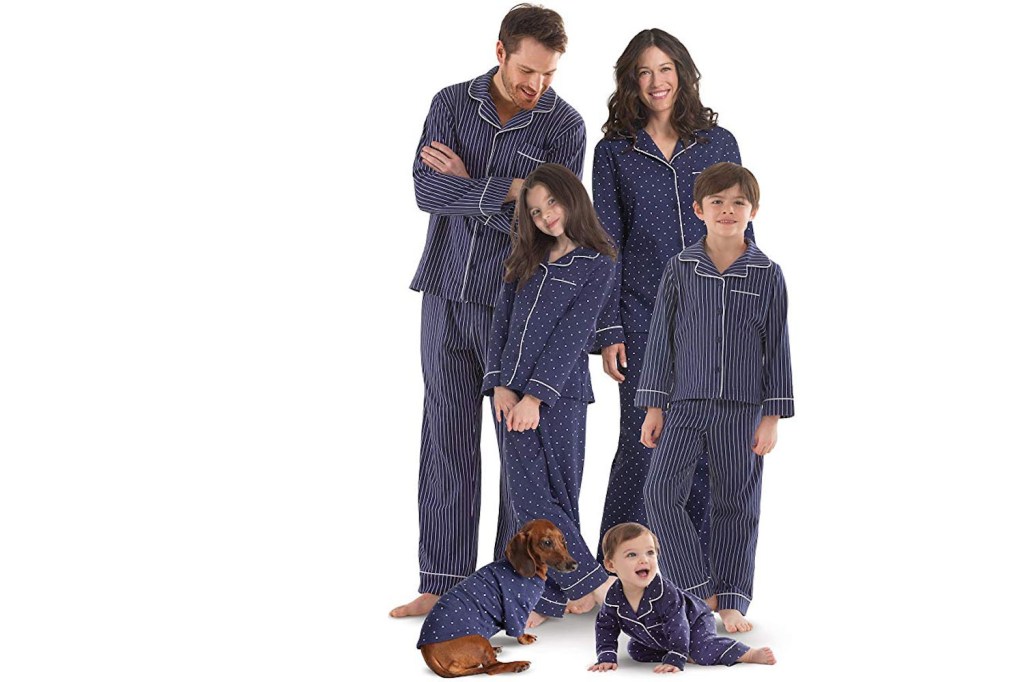 family wearing matching blue pajamas set