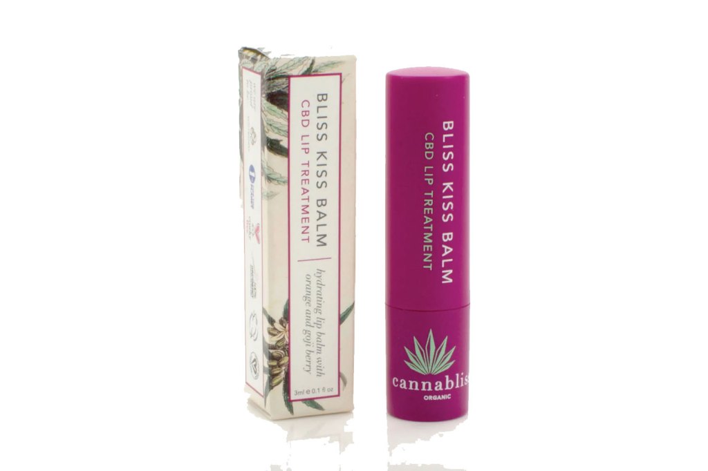 a box next to a berry colored lip gloss