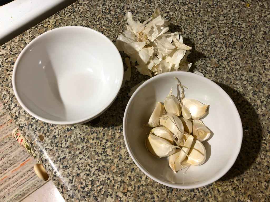 peeling garlic