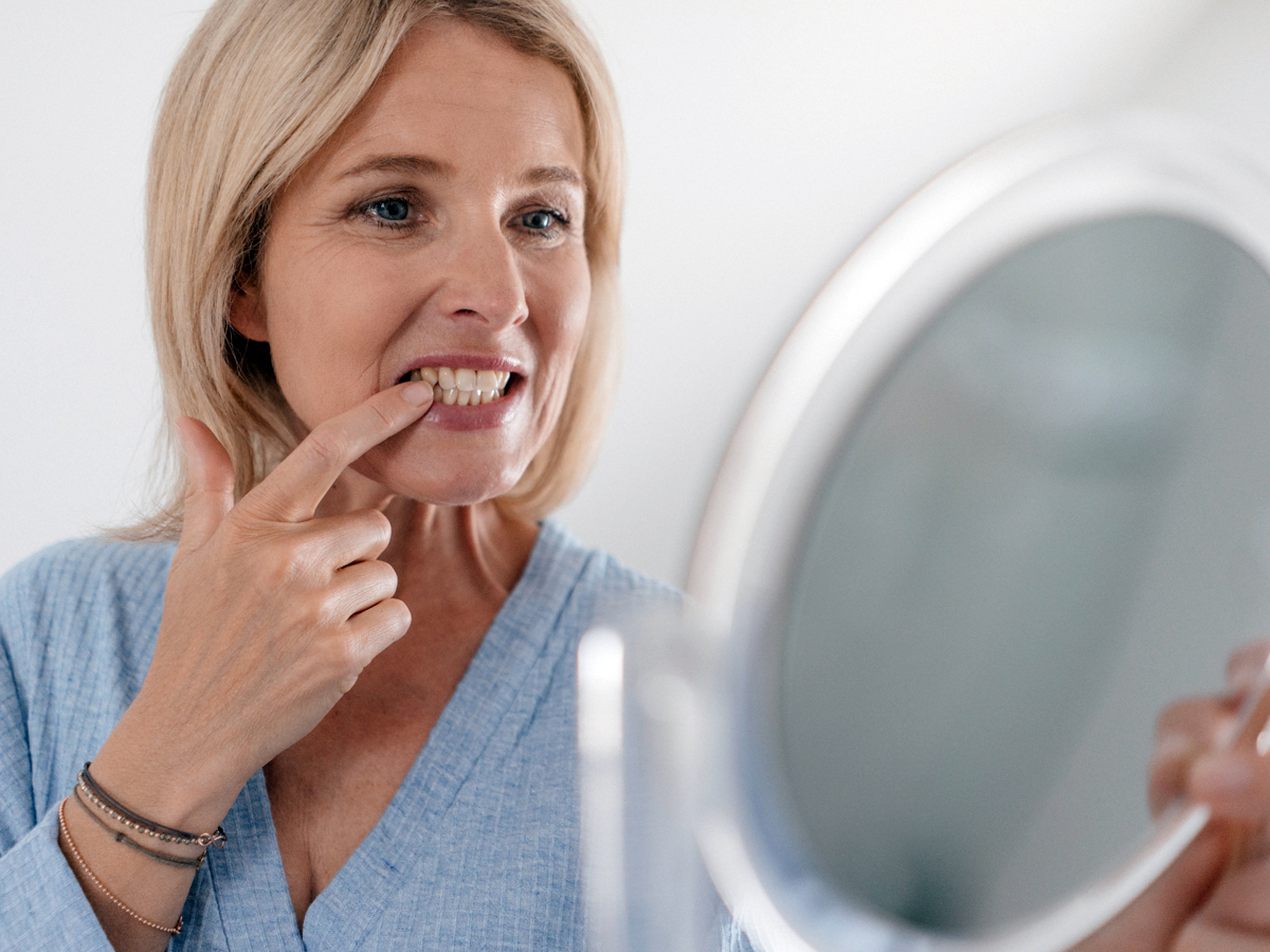 https://www.womansworld.com/wp-content/uploads/2019/09/menopause-dental-health.jpg