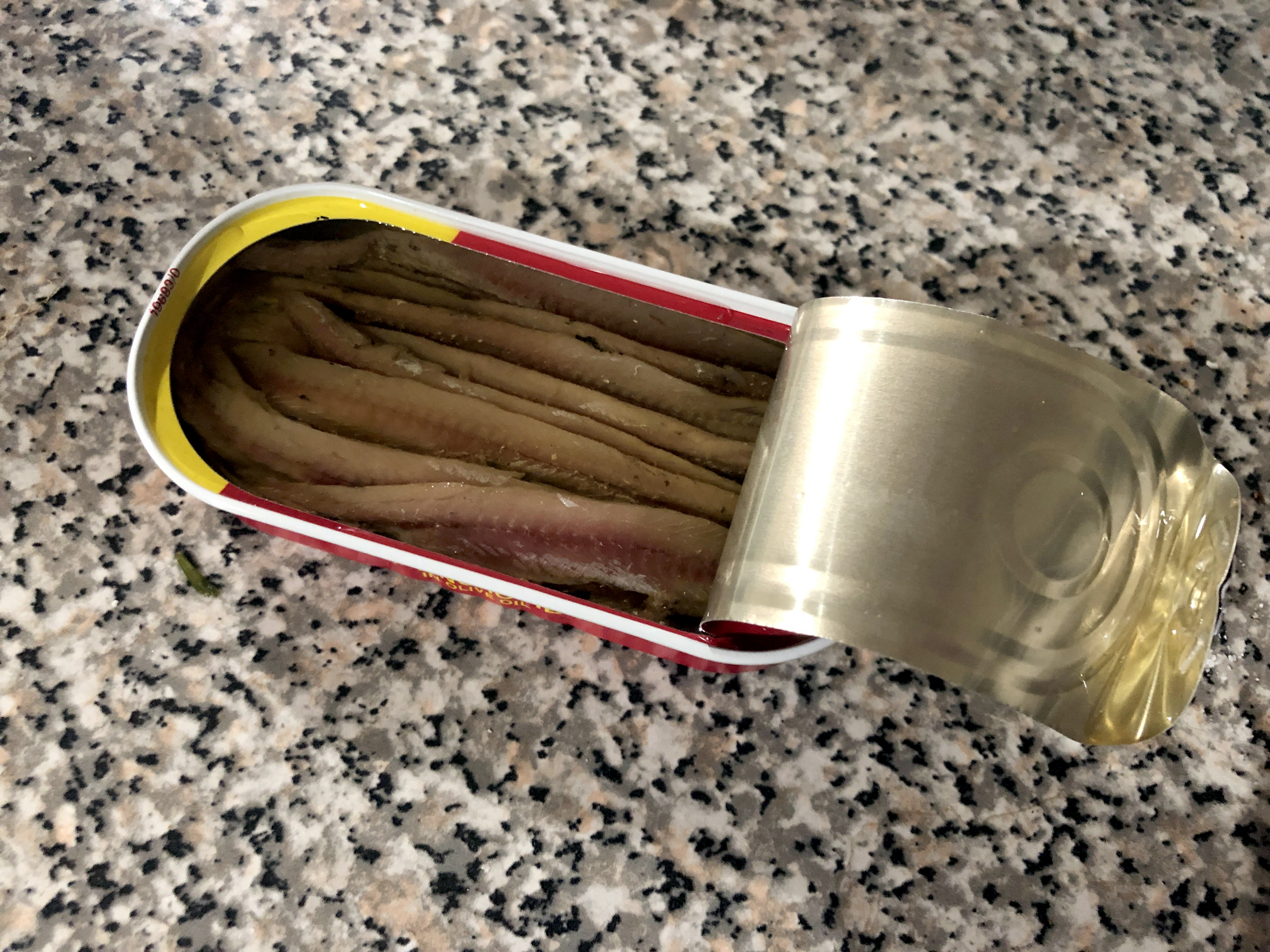 opened can of anchovies