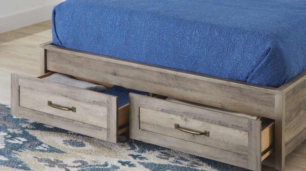 bottom of a wooden farmhouse bed