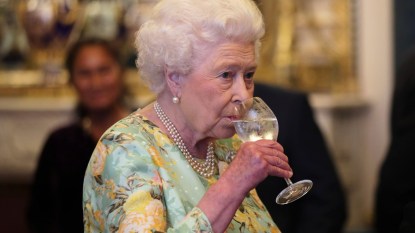 Queen Elizabeth sipping water from glass