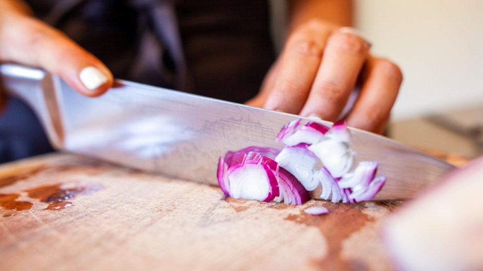Woman chopping onions