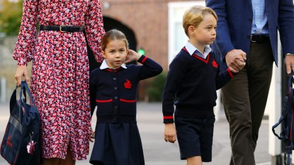 Prince George and Princess Charlotte walking to school
