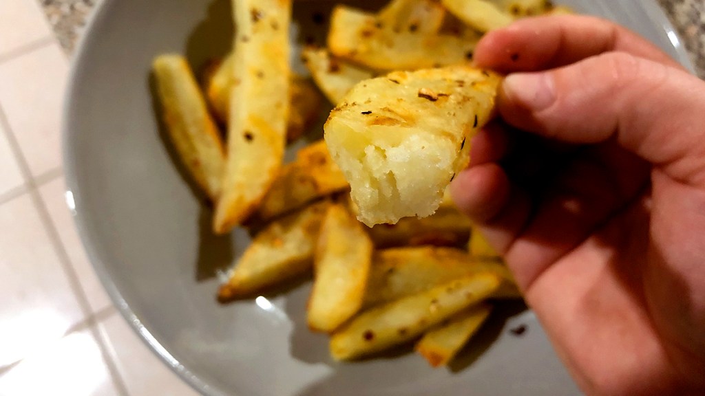 Roasted potato with bite taken out of it