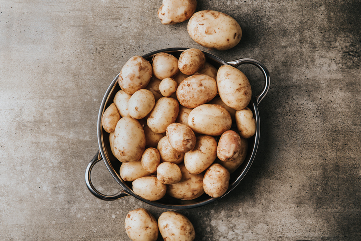 Raw potatoes in a pot