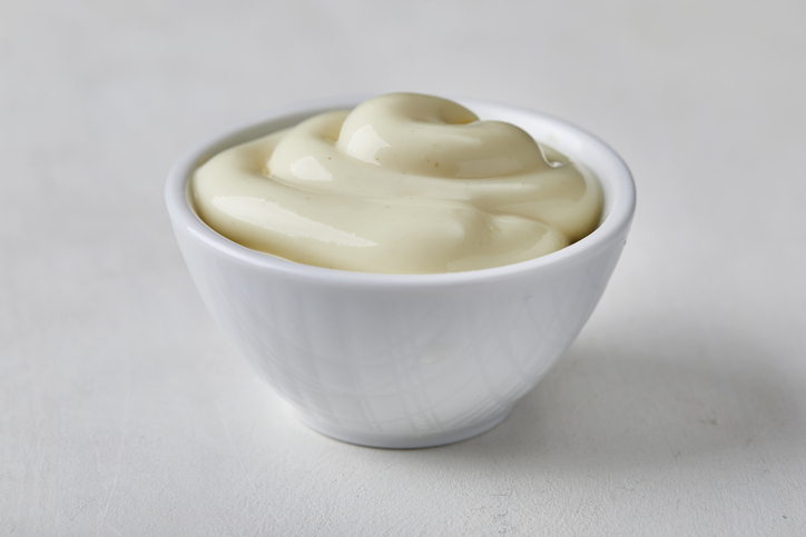 mayonnaise in small white ceramic bowl