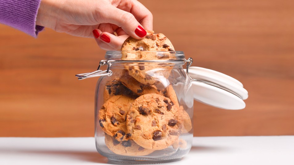 Woman reaching for cookies