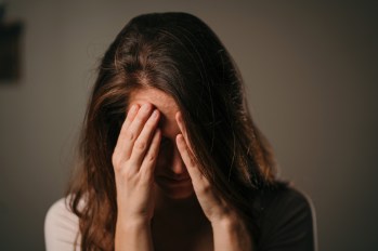 Woman with headache pain