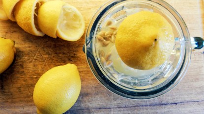 Lemons and a lemon juicer