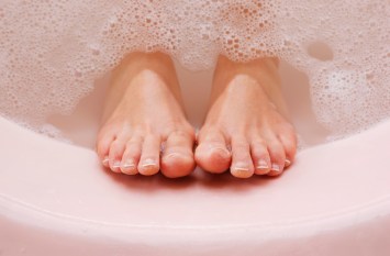 feet soaking in a bath