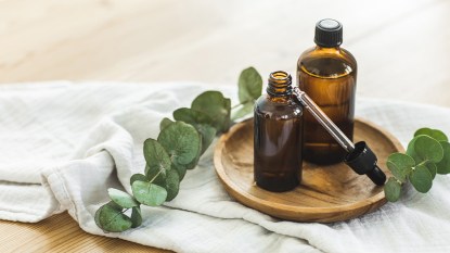 essential oil bottles for cleaning on a towel
