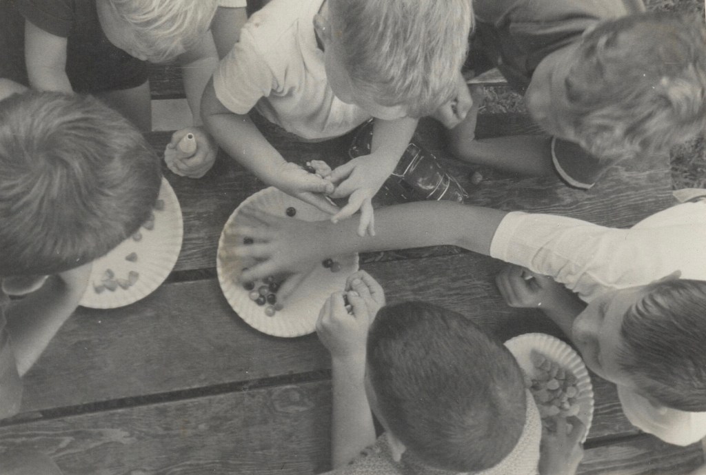 Kids dividing candy, 1959