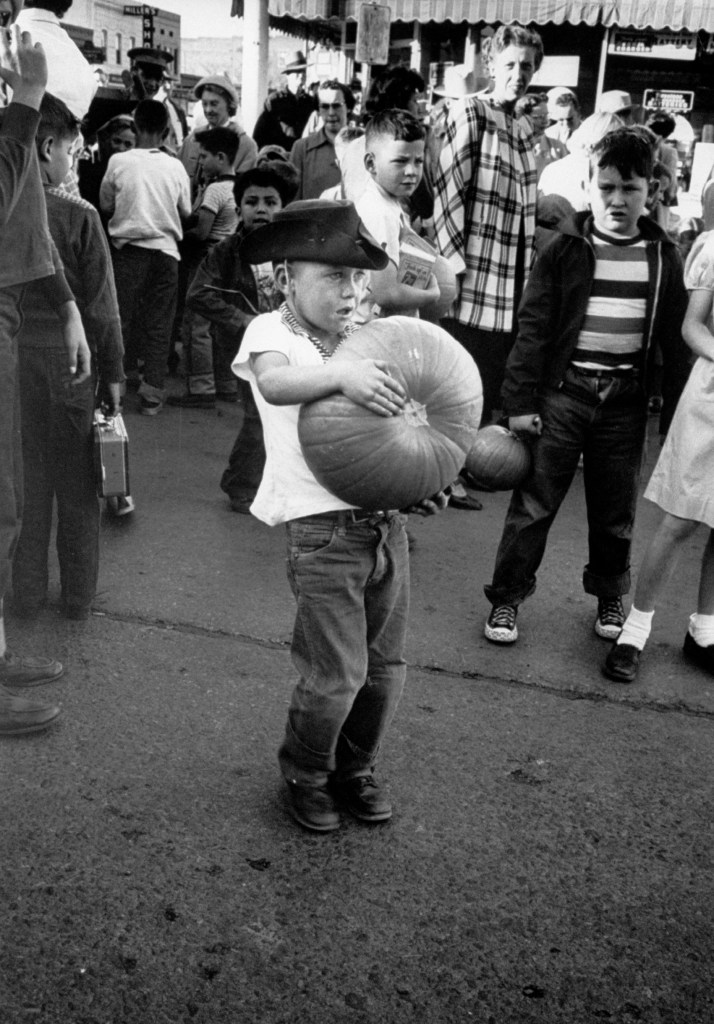 A Young Boy Carries Away a Pumpkin, 1953