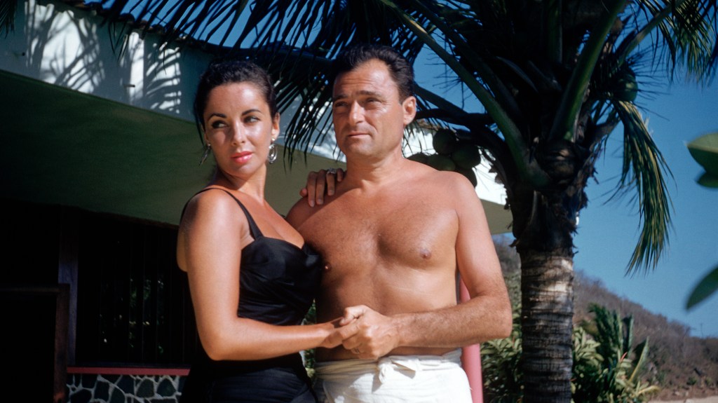 Elizabeth Taylor and Michael Todd in swimsuits on their honeymoon