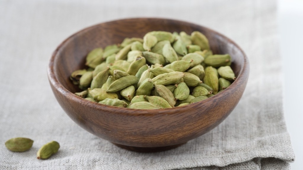Cardamom in a wooden bowl, a holiday spice