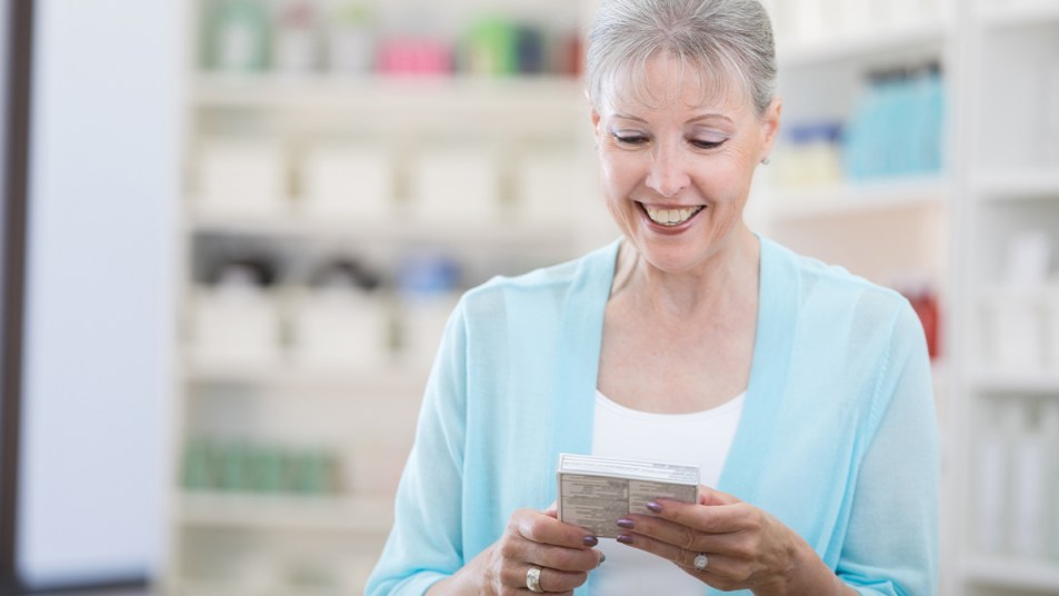 Woman Buying Her Prescription