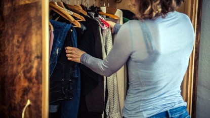 Woman organizing her closet