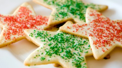 Star-shaped sugar cookies with red and green sprinkles