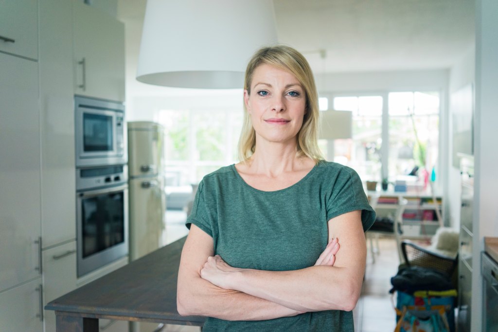 woman standing in kitchen