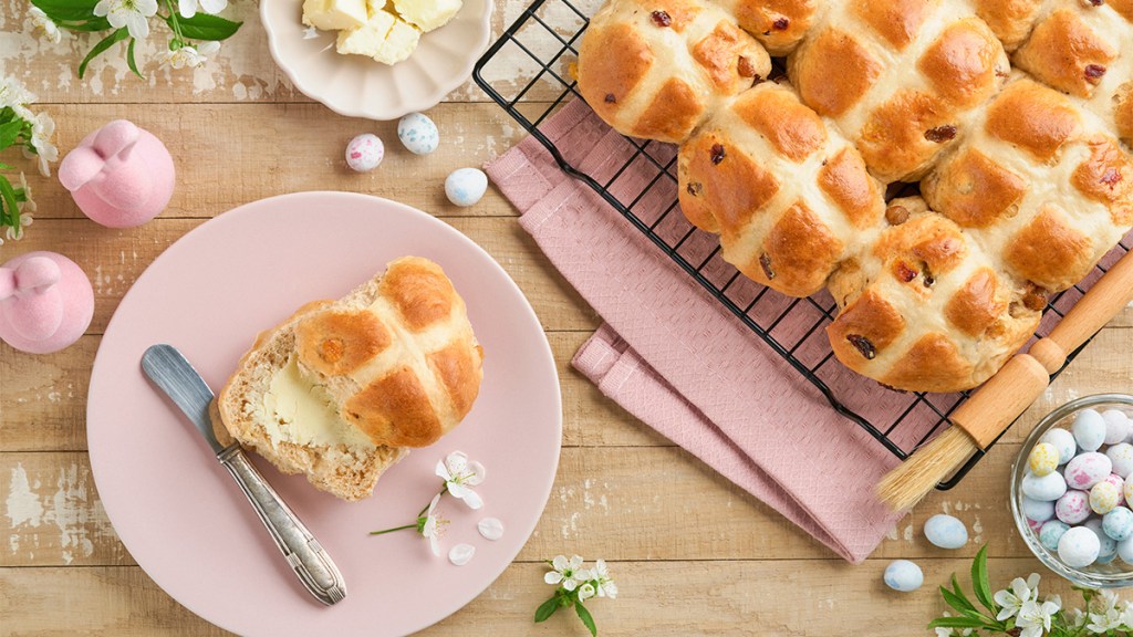 Hot cross buns for Good Friday on a wire rack