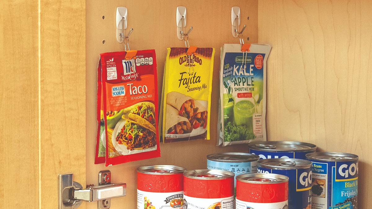 Seasoning packets organized in a small pantry