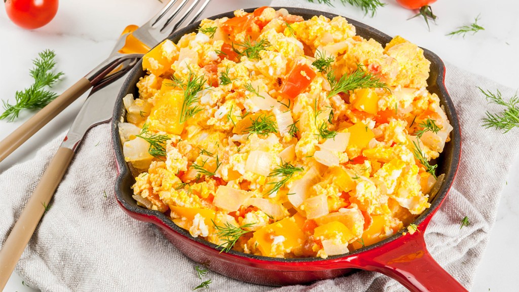 Scrambled eggs with bell peppers and onions