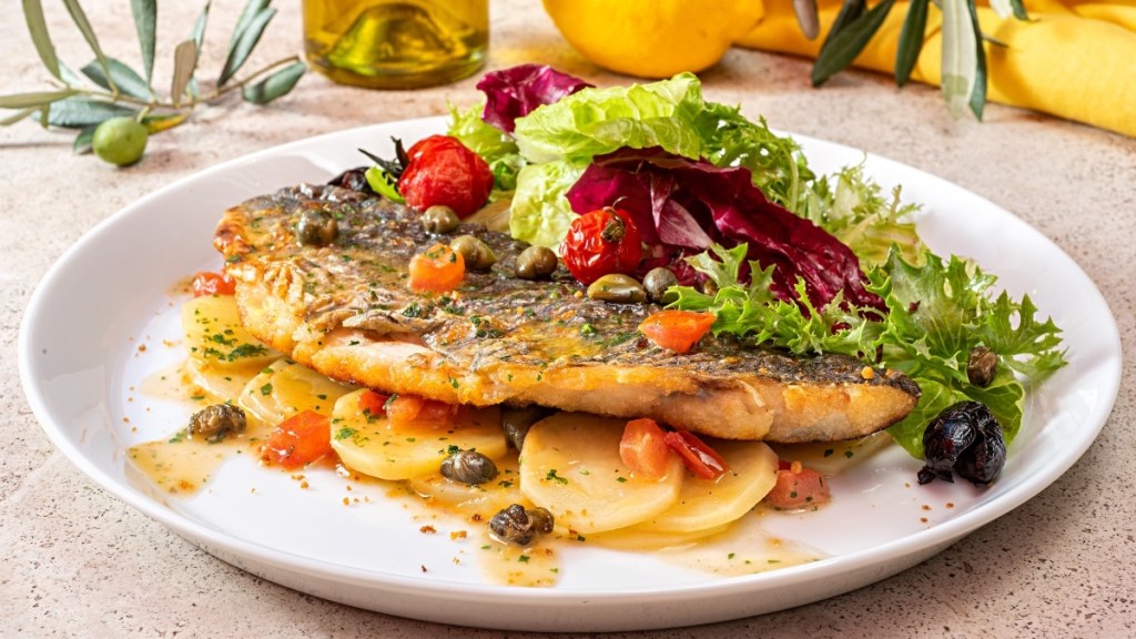 Cooked fishes with olive oil and greens, a diet that can ease peripheral artery disease symptoms