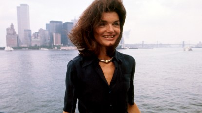 Jacqueline Kennedy with NYC skyline in background