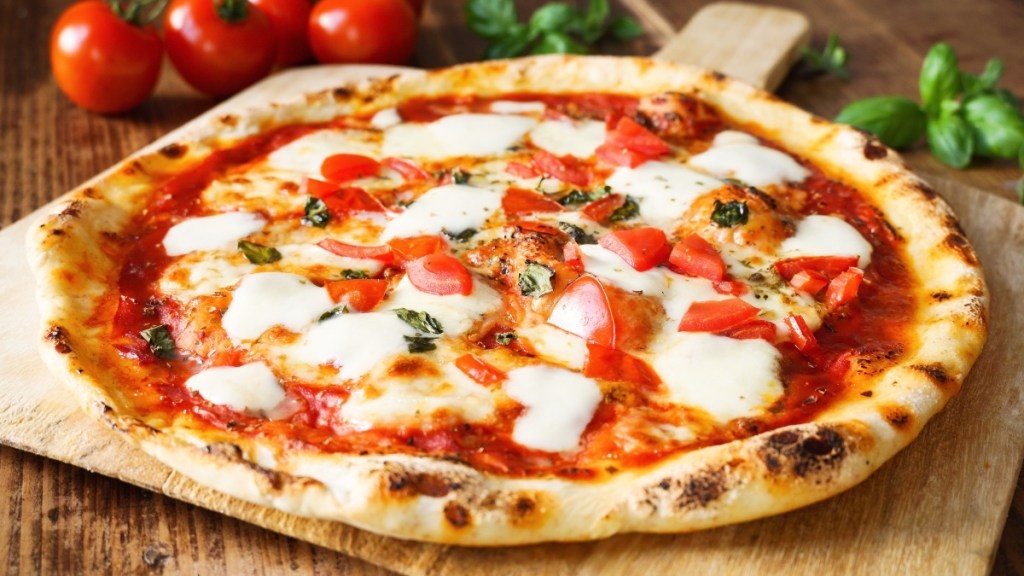 A cheesy pizza, which can help prevent kidney stones