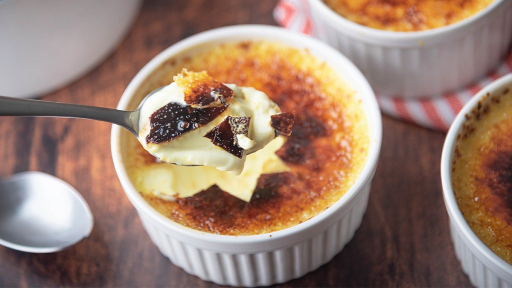 A 3 ingredient creme brulee with a scoop taken out