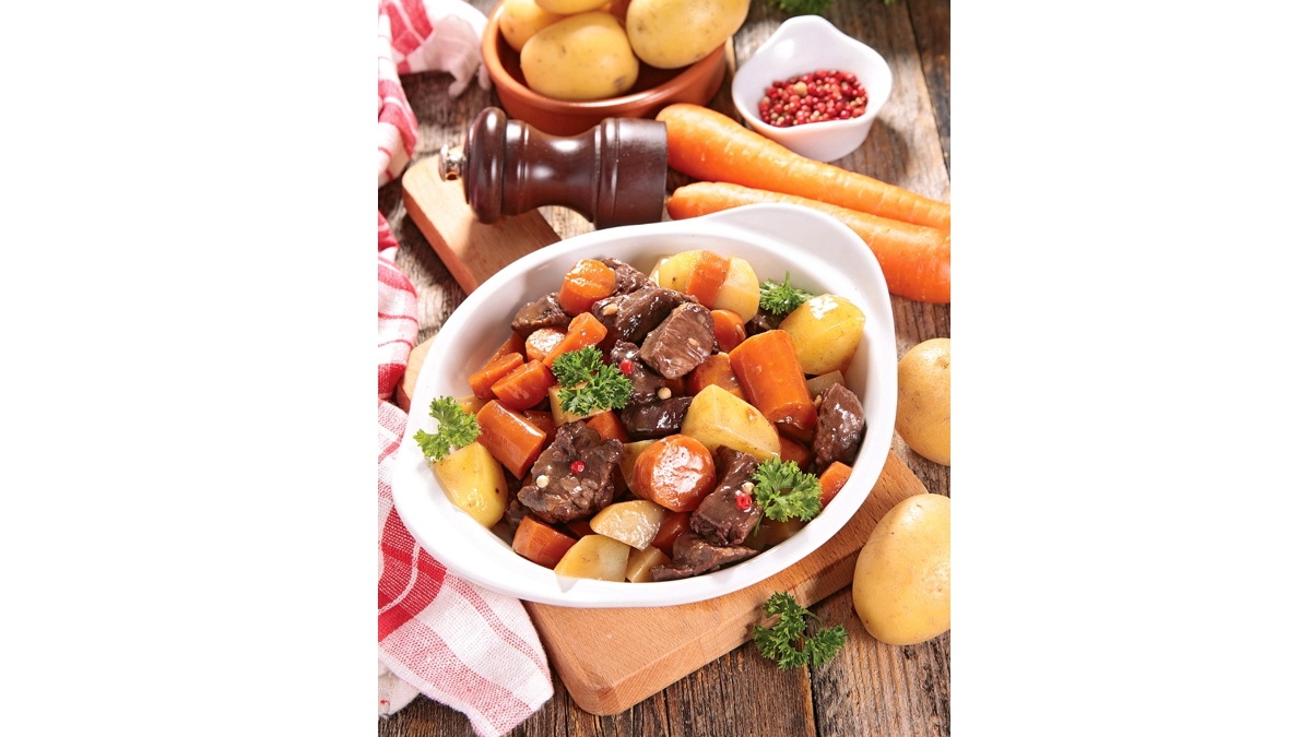 Beef and Vegetable Stew in a white serving dish